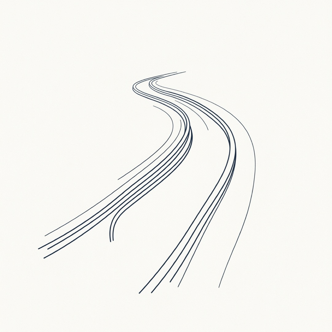 Two rails curving into the distance. Defined path, not constrained motion.